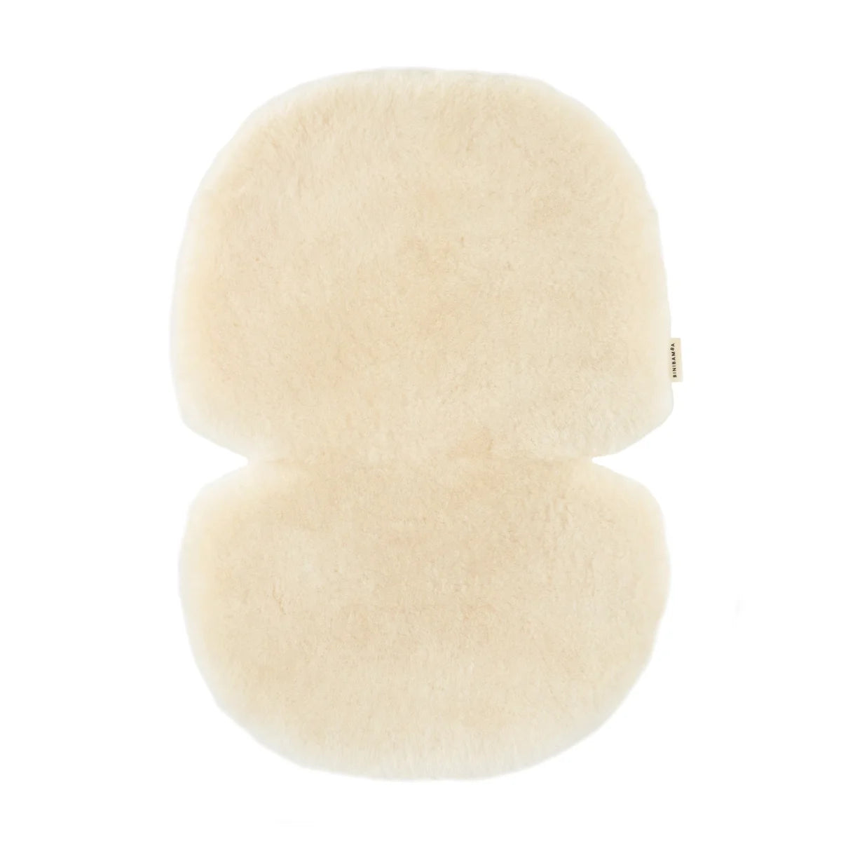 Fluffy figure-eight cushion in off-white color from Schaffell Snuggler Milk