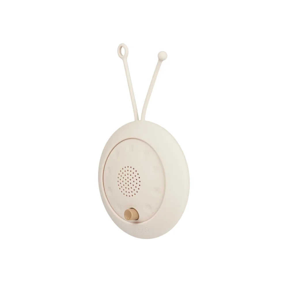 Helles cremfarbenes runder Baby-Mobile-Musikbox mit zwei oberen Schlaufen und Lautsprechergitter