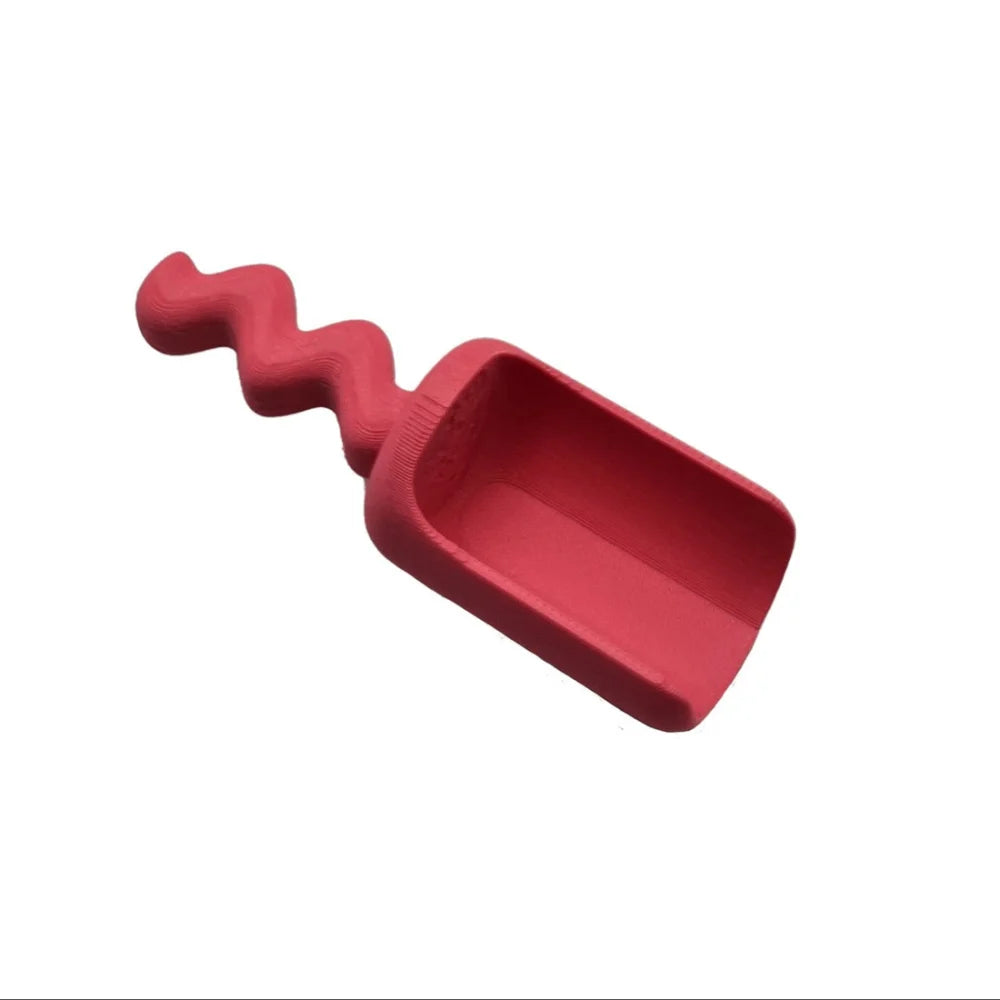 Buntes spielschäufelchen wave mit welligem Griff in Pastel rot, ideal für Kinder