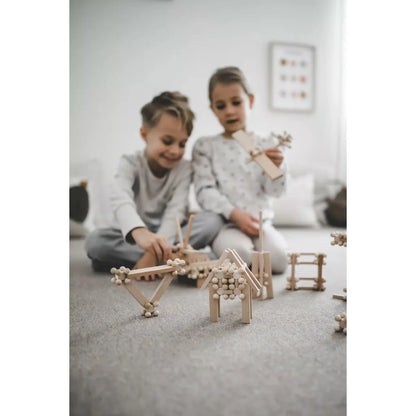 Holzbausatz START 140 mit hellen Sticks, runden Verbindern, 24 Brixis, 20 Twister und 96 Timber Bricks