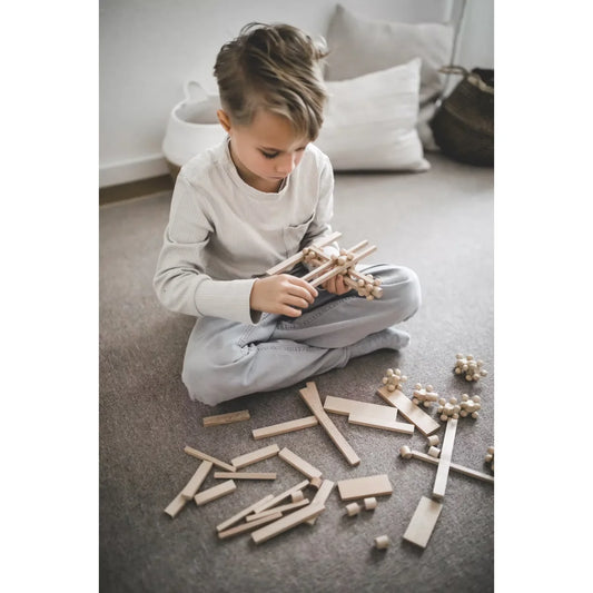 Kind leimt START 40 Spielset mit Brixis, Twister und Timber Bricks