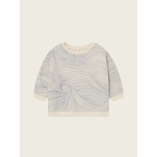 Langärmliges cremefarbenes Sweatshirt mit dunklem grauem Wellenmuster aus dem Produkt Seascape Undyed