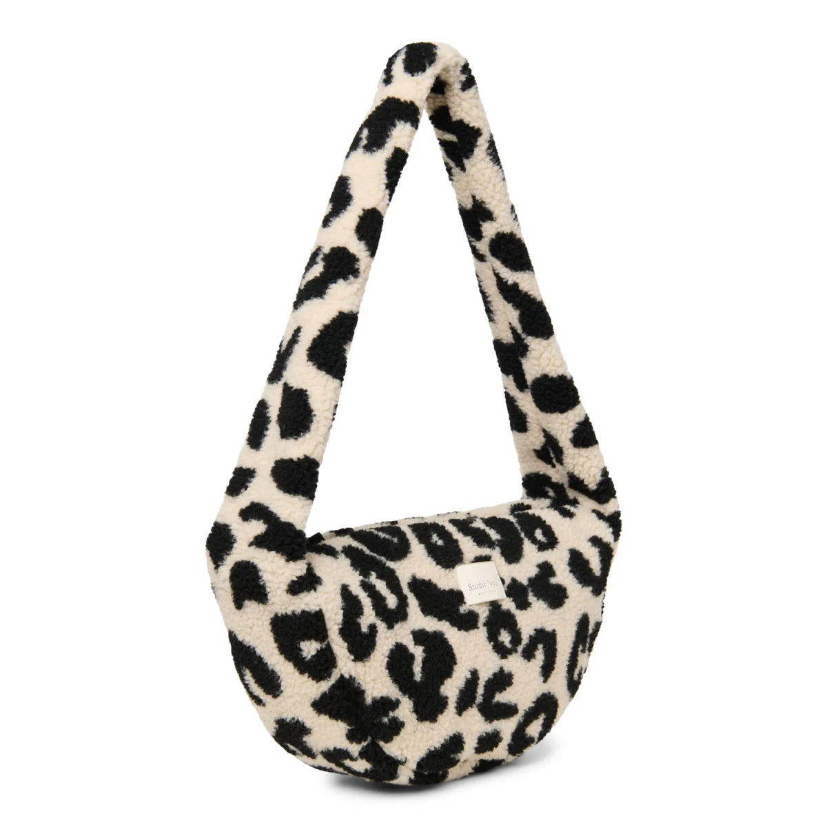 Gemütliche Teddy Mini Cross Body Bag in Creme-Schwarz-Leopardmuster von Holy Cow