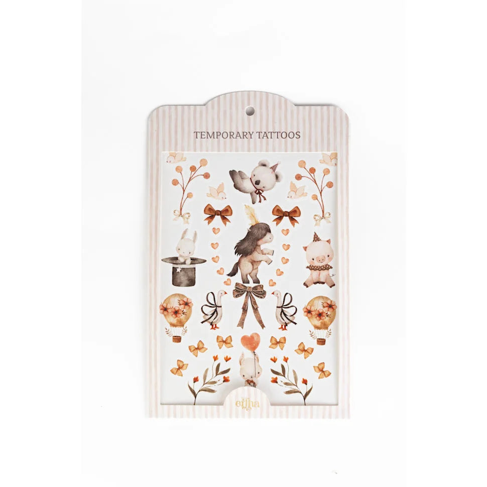 Temporäre Kindertattoos: Einhorn-Set mit herbstlichen Farben und Blumen auf weißer Karte