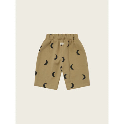 Tanshorts mit schwarzen Mondmustern für Traveller Pants Dusky Midnight