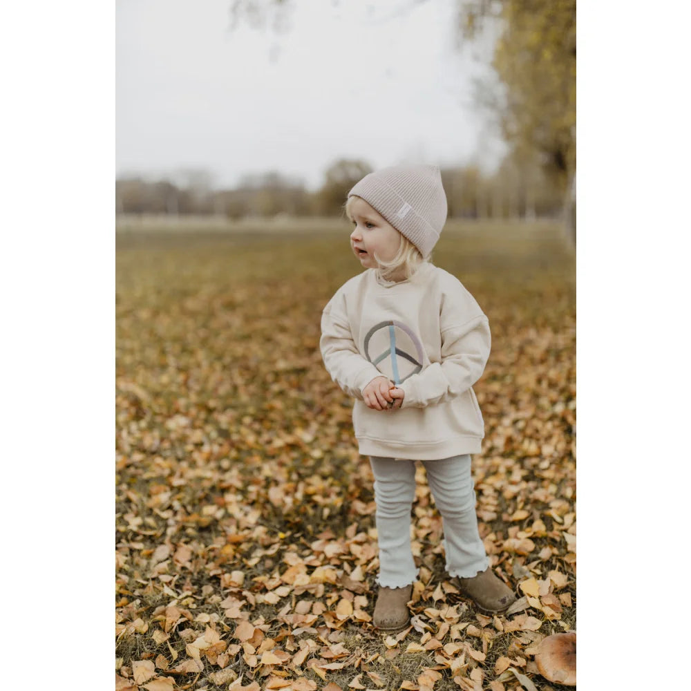 Beige peace sign hoodie, gray beanie, light blue jeans, Unisex Oversized Sweatshirt