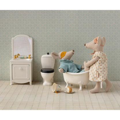 Creme Waschbeckenkommode mit beigem Polka-Punkt-Kleid