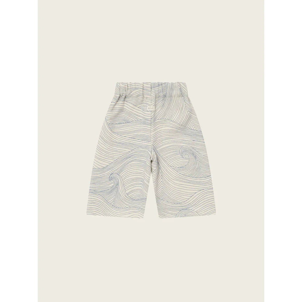 Weiße Culottes mit blauer Wellenmuster und elastischem Bund für elegante Strandkleidung