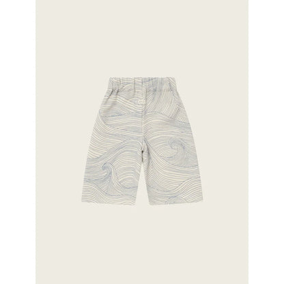 Weiße Culottes mit blauer Wellenmuster und elastischem Bund für elegante Strandkleidung