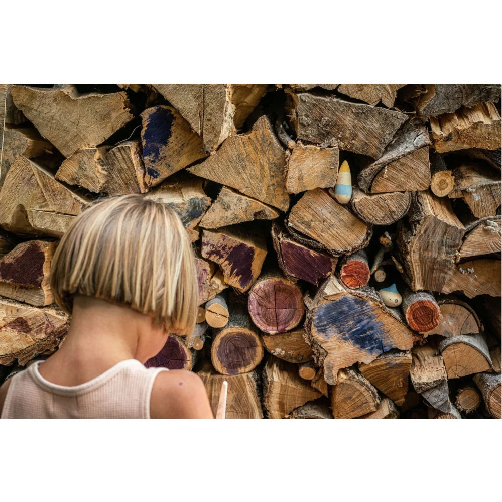 Neatly stacked firewood in varied colors and textures for winter, Wow!