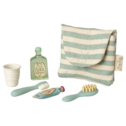 Miniatur gestreifte zahnbürsten-set tasche in mintgrün und creme aus gewebtem stoff mit sticklogo ideal für ökologische baby- & kinderprodukte
