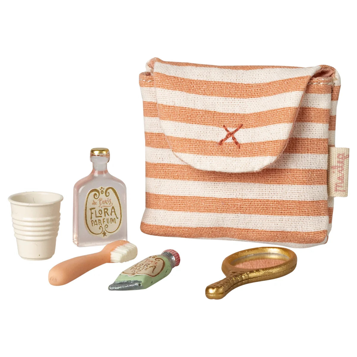 Rot gestreiftes zahnbürsten-set in tasche mit roten kreuzstich-klappe und gewebtem etikett für ökologische baby- & kinderprodukte